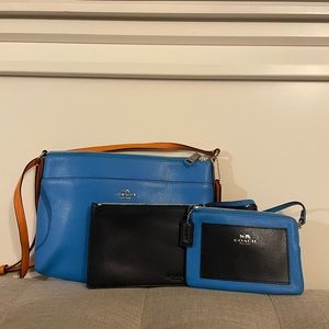 Coach three piece set with crossbody, wristlet and wallet.